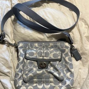 Light blue coach logo crossbody bag